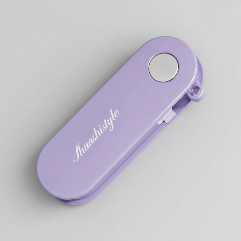 Épluche carotte pliable compact violet
