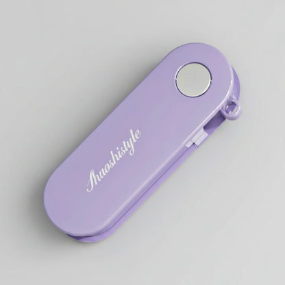 Épluche carotte pliable compact violet