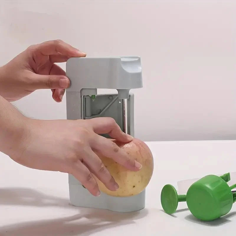 Éplucheur à pommes insertion pomme sur support pomme