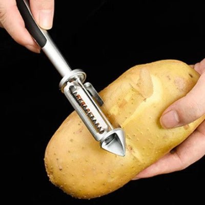 Eplucheur légume éclat épluchant pomme de terre