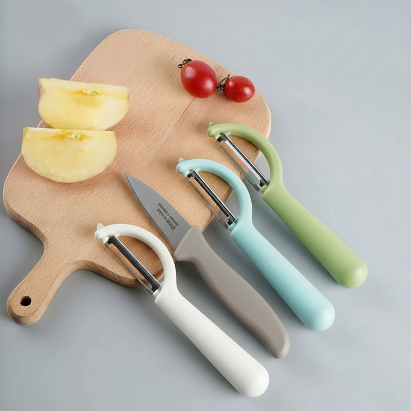 Éplucheur légumes magique sur planche découper avec pomme-
