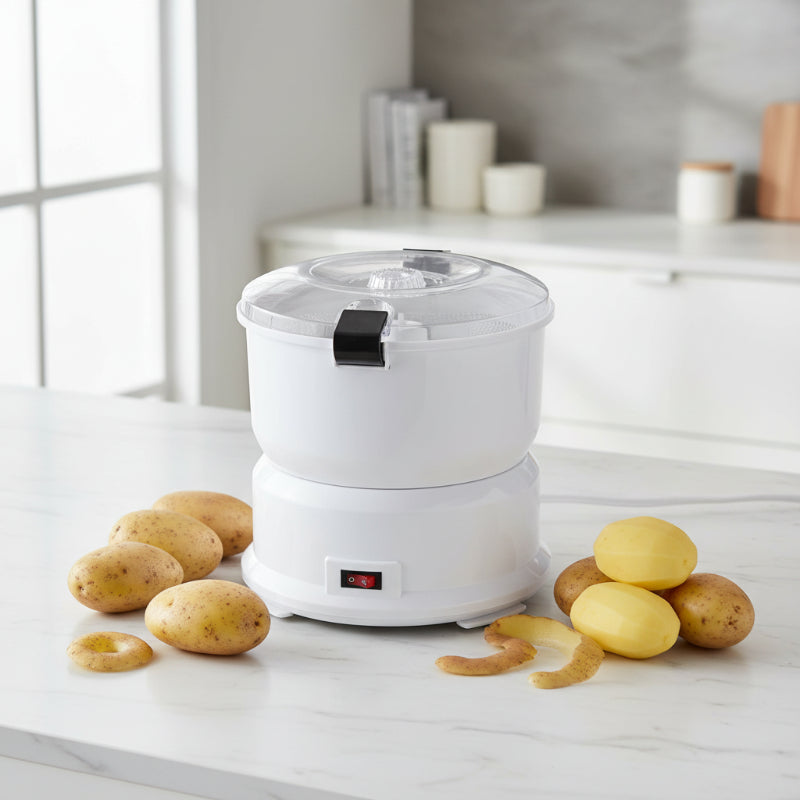 Eplucheur pomme de terre sur comptoir cuisine avec pomme de terre