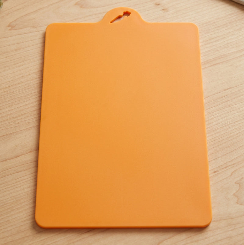 Planche à découper plastique orange