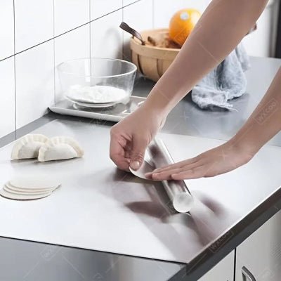 Planche a decouper signature inox préparation dumpling