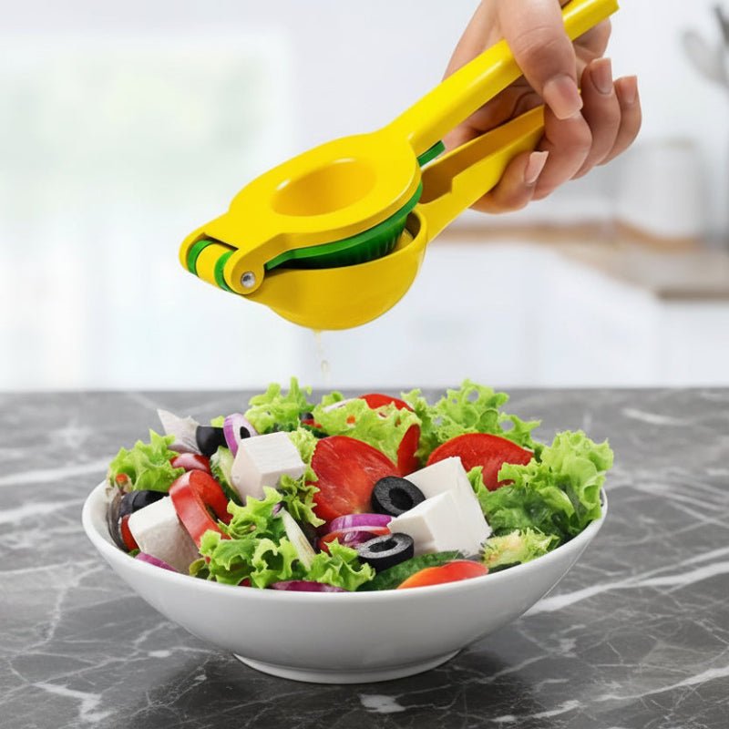Presse fruits presser jus citron directement dans salade grecque