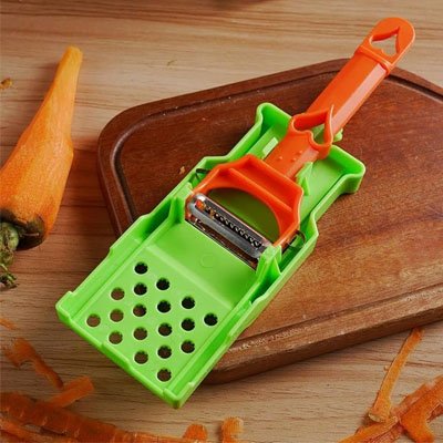 Eplucheur carotte avec base protectrice pour rangement