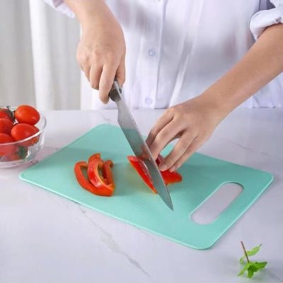 Planche à decouper glisse pas tranchant du poivron