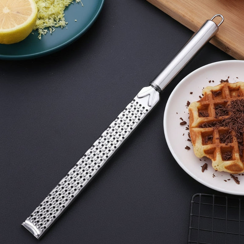 Zesteur avec manche ergonomique à bout arrondi assiette gaufre